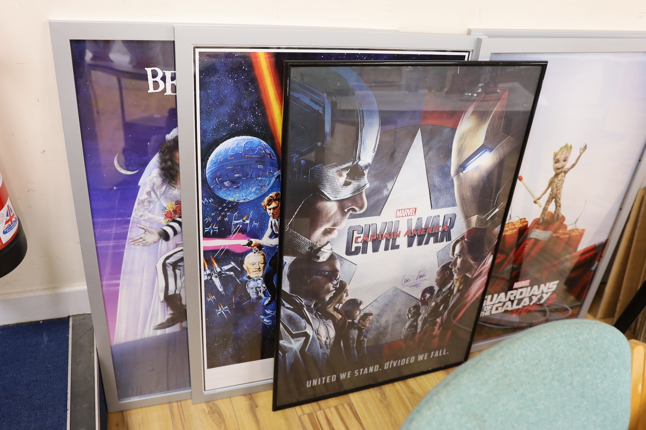Five framed cinema posters, Captain America Civil War signed by Chris Evans, who played Captain America, from Eastbourne Odeon